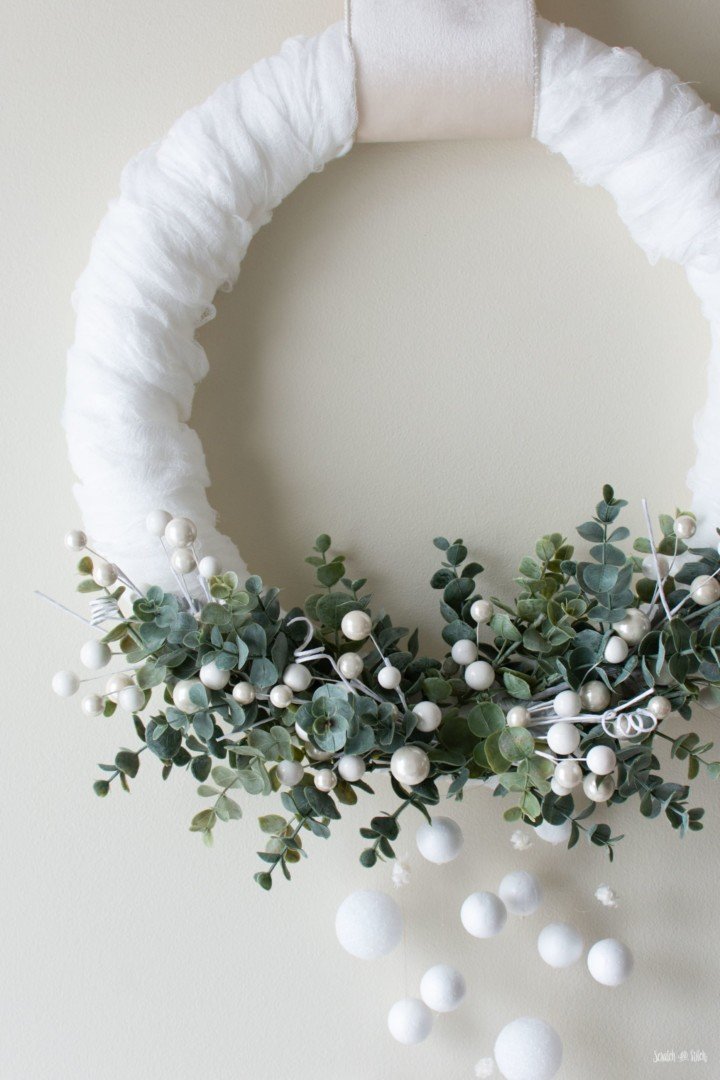 snowy and green wreath